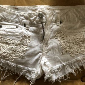 White Ripped Jean Shorts with Lace Pockets